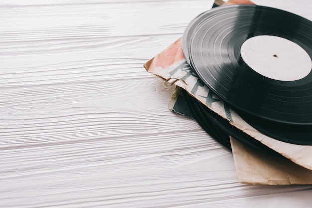 music records on wooden background 