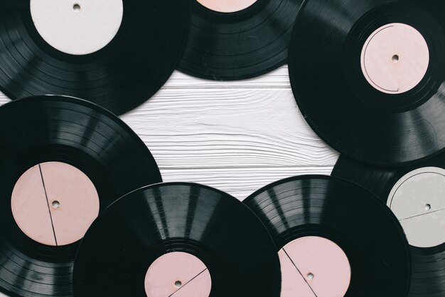 music records on wooden background 