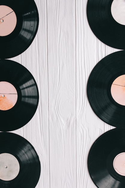 music records on wooden background 