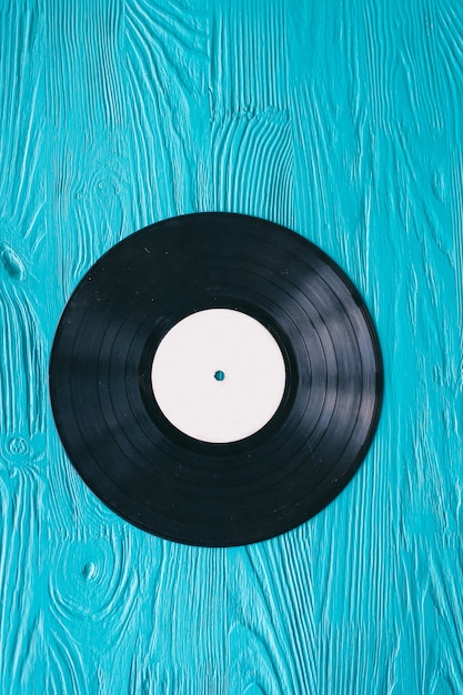 music records on wooden background 