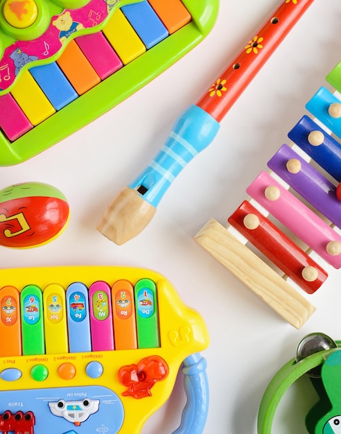 Musical instruments collection on white background Top view