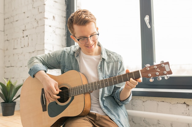 Musician man with guitar