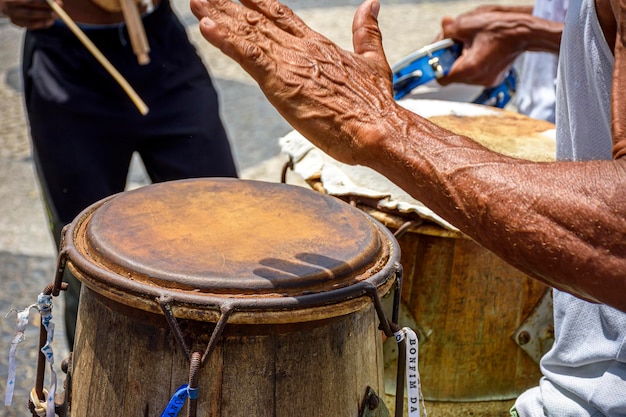 Musicians playing traditional instrumentsin the streets of Pelourinho in Salvador Bahia