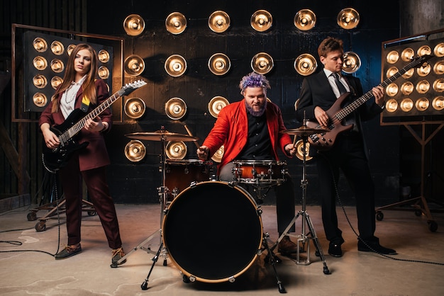 Musicians in suits on the stage, retro style