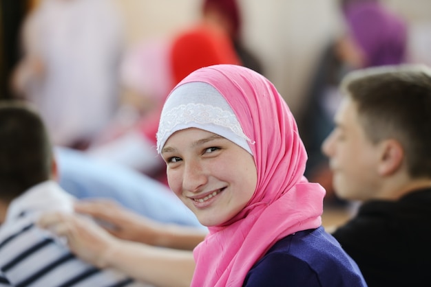 Muslim and Arabic girls learning together in group