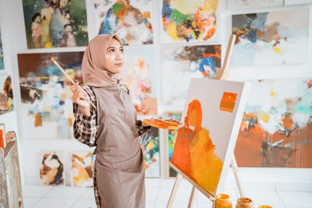 Muslim artist painter thinking about what to paint