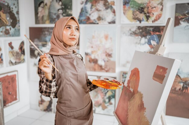 Muslim artist painter thinking about what to paint