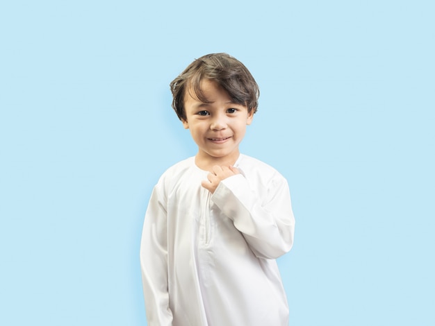 Muslim boy in a dress