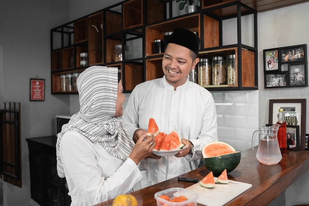 Muslim couple breaking the fast together