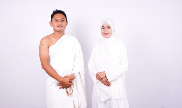 Muslim couple wear ihram isolated