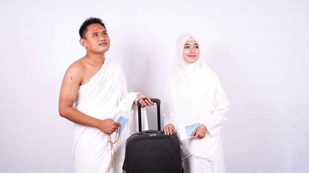 Muslim couple wear ihram isolated