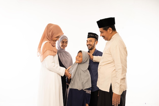 Muslim family embracing during family eid mubarak celebration