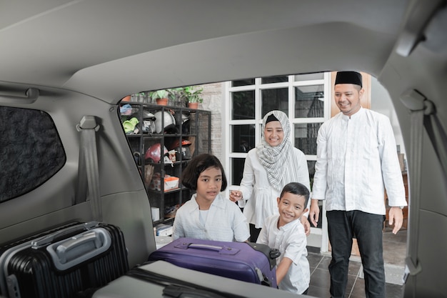 Muslim family filling the car