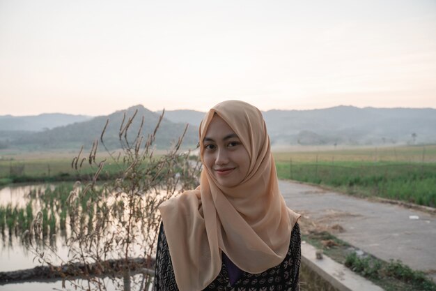 Muslim female teenager smiling