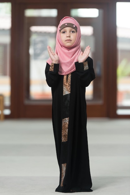 Muslim Girl Is Praying In The Mosque