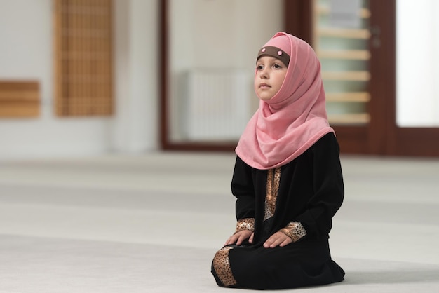 Muslim Girl Is Praying In The Mosque