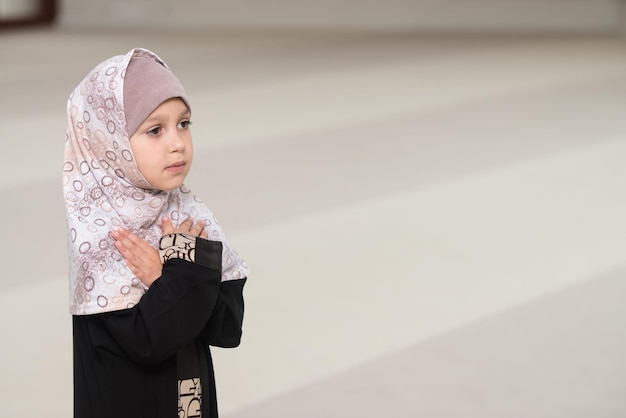 Muslim Girl Is Praying In The Mosque