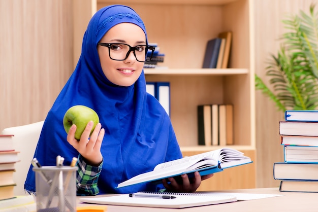 Muslim girl preparing for entry exams