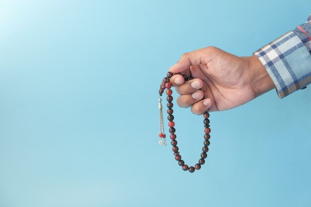 muslim man hand praying during ramadan, Close up