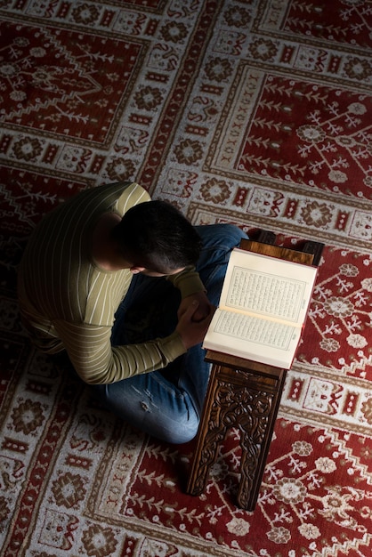 Muslim Man Is Reading The Koran