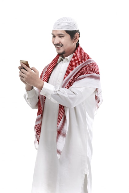 Muslim man using cellphone 