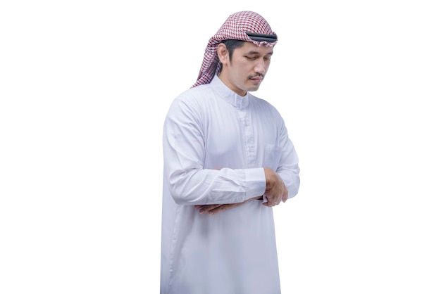 Muslim man with keffiyeh with agal in praying position salat