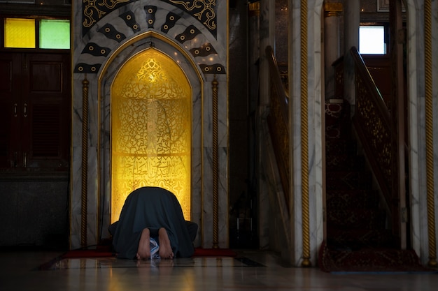 Muslim men pray at a mosque in Phra Nakhon Si Ayutthaya Province, Thailand.