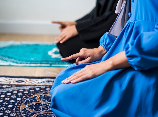 Muslim prayers in Tashahhud posture