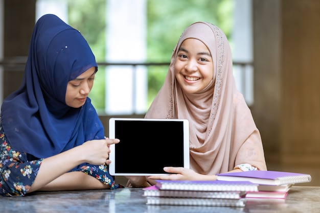 Muslim Student reading book