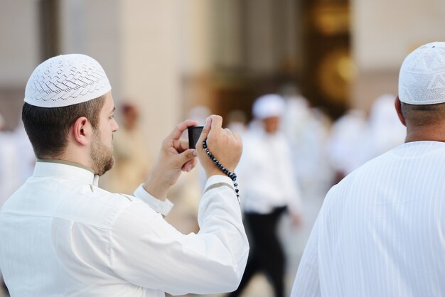 Muslim taking photo at Madina haram