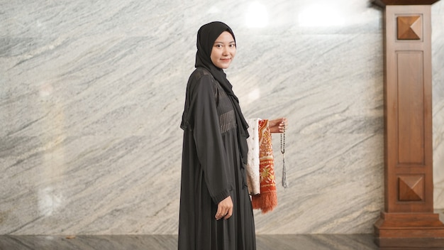 Muslim woman after worship at the mosque