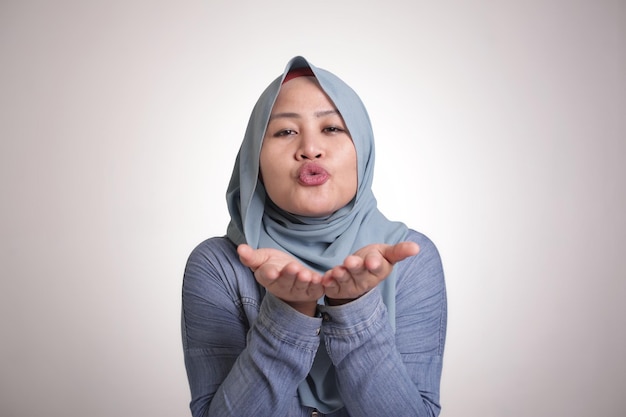 Muslim Woman Doing Air Kiss Gesture