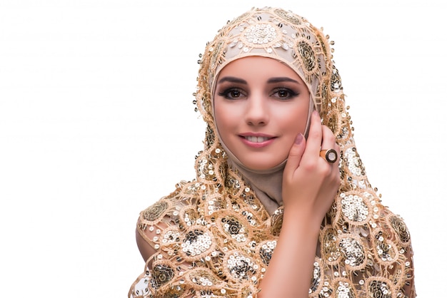 Muslim woman in gold cover isolated