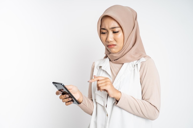 Muslim woman shocked while using mobile phone