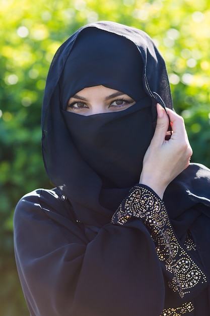 Muslim woman with beautiful eyes in national dress