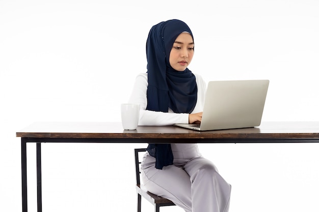 Muslim woman working from home