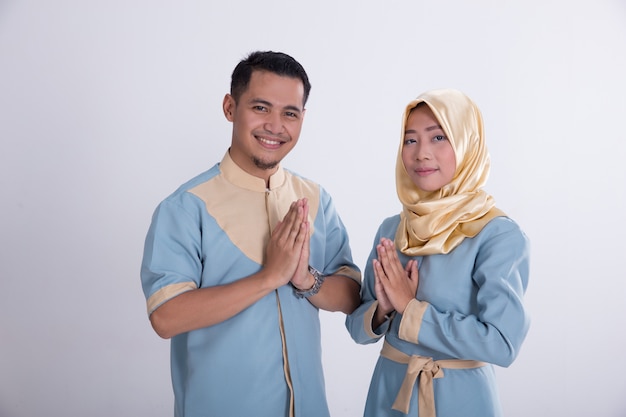 Muslim young couple greeting