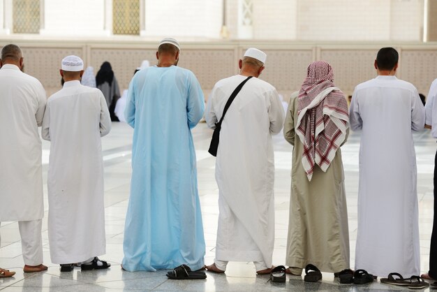 Muslims praying together at Holy mosque