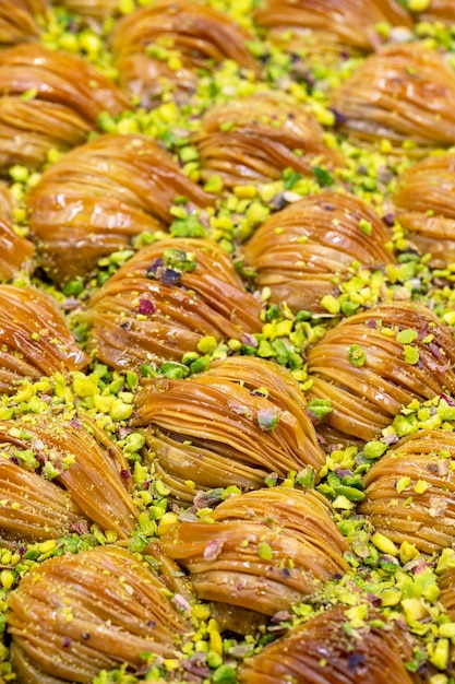 Mussel baklava with pistachio closeup traditional middle\
eastern flavors traditional turkish baklava local name midye\
baklava