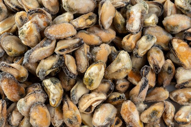 Mussels without shell at a market frozen Nice background shot from above