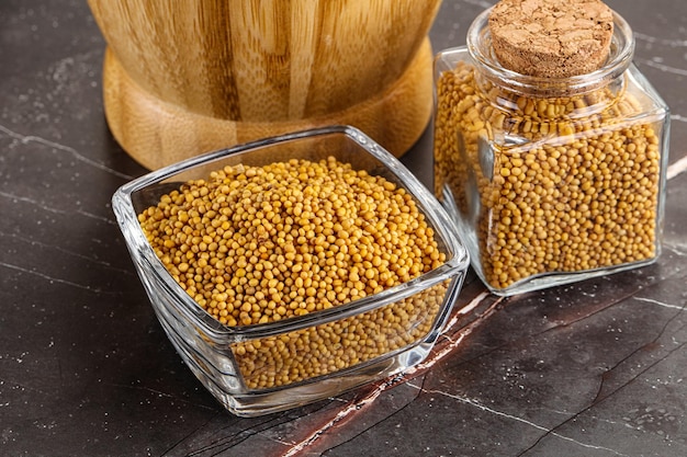 Mustard dry seeds in the bowl for cooking