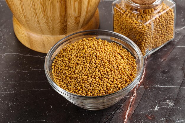 Mustard dry seeds in the bowl for cooking