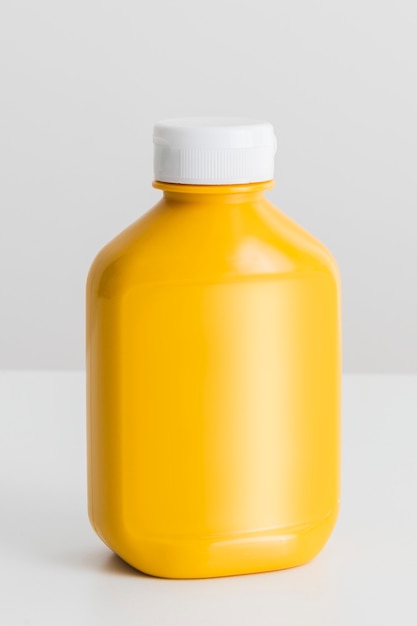 Mustard in yellow plastic bottle