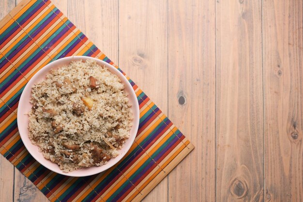 Mutton biryani meal in a plate on table