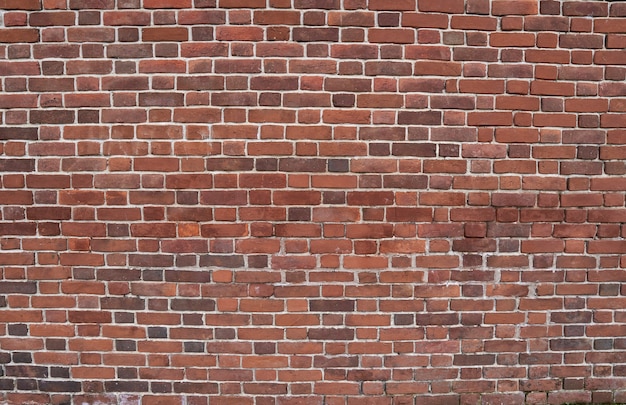 Muur van oude rode baksteen. baksteen achtergrond. textuur