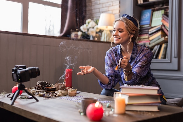 Photo my blog. delighted nice fortune teller speaking to her viewers while having her own blog