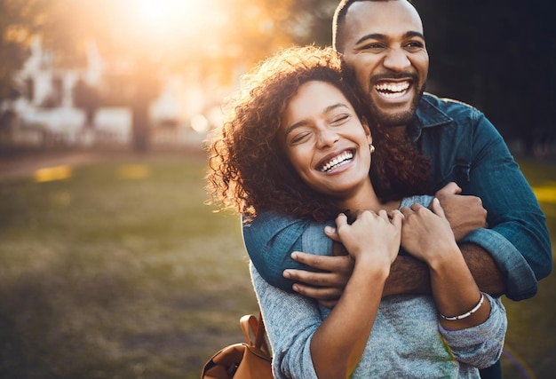 Photo my love is all yours shot of an affectionate young couple bonding together outdoors