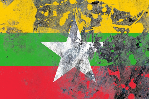 Myanmar flag on scratched old grunge texture background