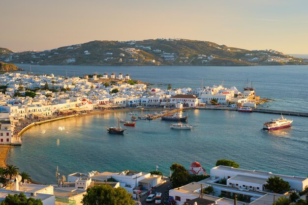 Photo mykonos island port with boats cyclades islands greece