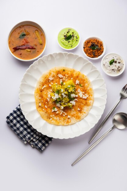 Mysore Masala Dosa or open dosa served with sambar and chutney selective focus